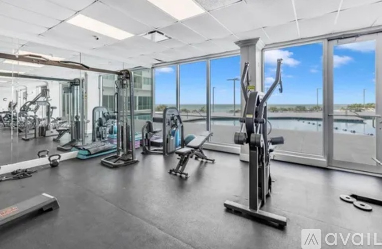 A gym with a view of the water.