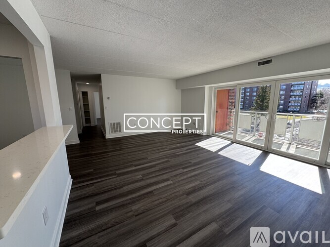 A room with CONCEPT PROPERTIES written on the wall.