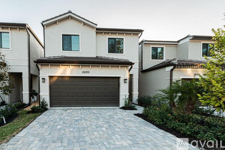 A house with the number 2605 on the garage door.