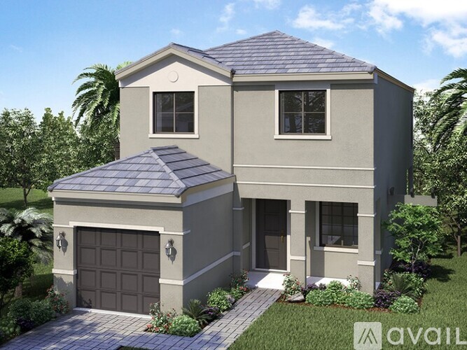 A modern house with a garage is available for sale.