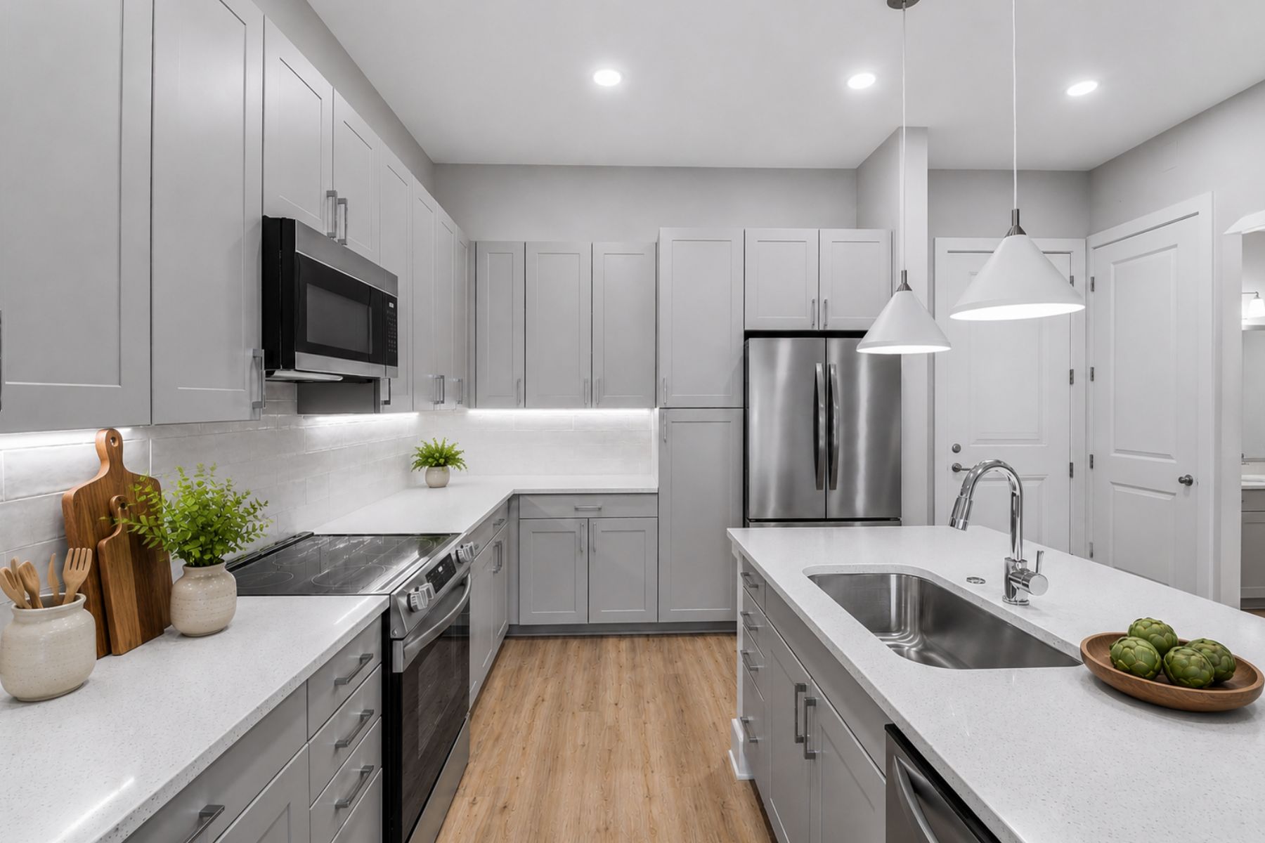 Gourmet Kitchen with Quartz Countertops | Brooking Square Rentals on the Waterline