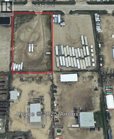 An aerial view of a construction site at 144 Ave.