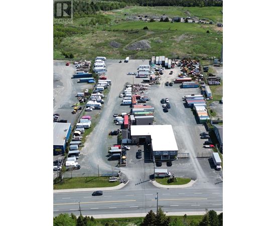 A parking lot with a large number of vehicles.