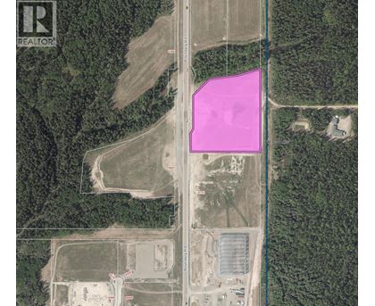 A satellite image of a property with a pink highlighted area.