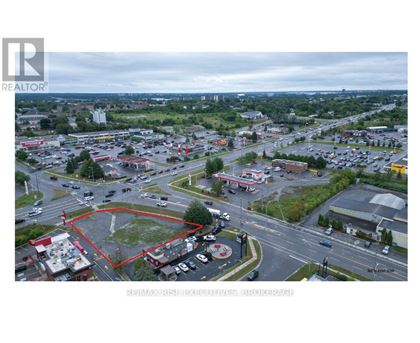 A realtor image of a parking lot with a red circle in the middle.
