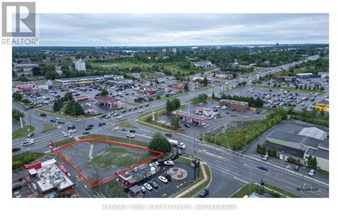 A realtor image of a parking lot with a red circle in the middle.