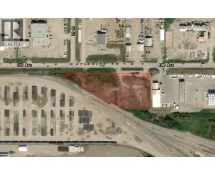 A red area in the middle of a parking lot.