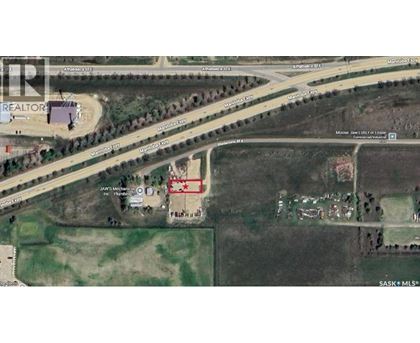 A satellite image shows a realtor's office and a house with a red star on it.