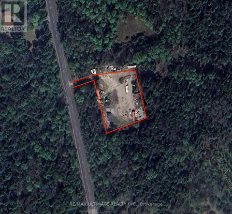 A property is outlined in red on a satellite image.