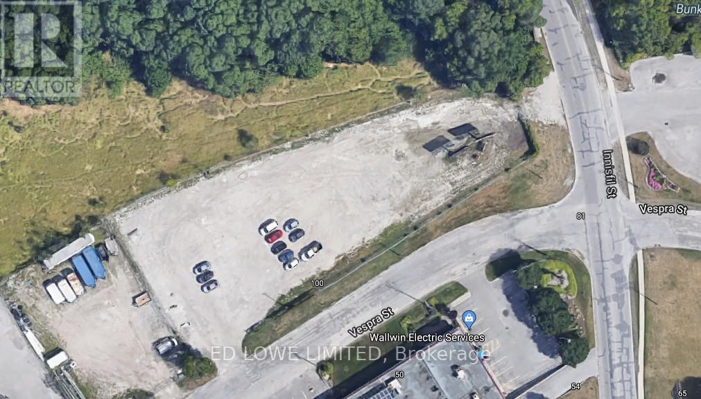 A satellite image shows a parking lot with a sign for Walwin Electrical Services.