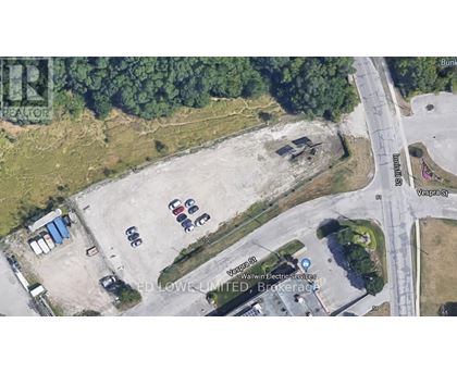 A satellite image shows a parking lot with a sign for Walwin Electrical Services.
