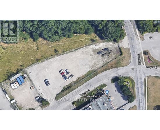A satellite image shows a parking lot with a sign for Walwin Electrical Services.