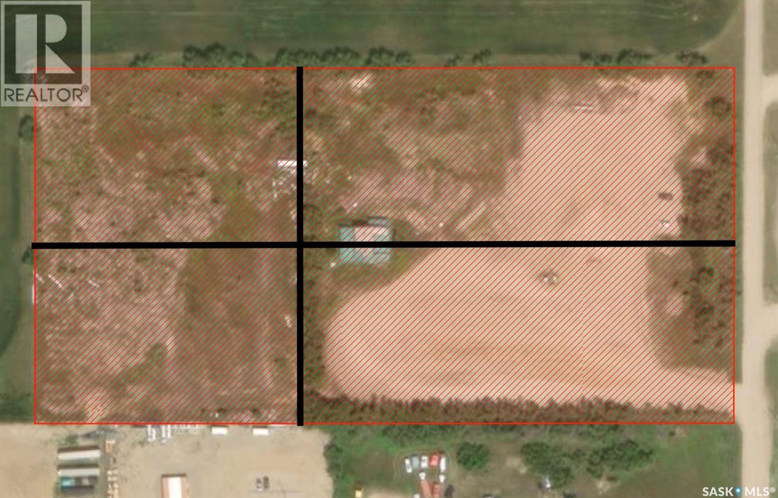 A satellite image of a property with a red line in the middle.