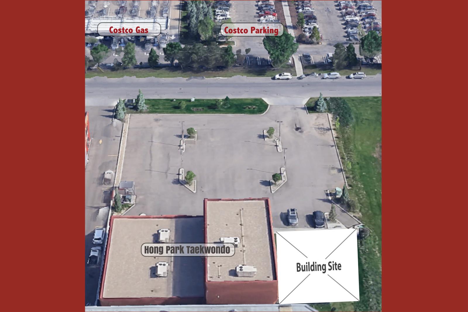 An aerial view of a parking lot with a building labeled "Hong Park Taekwondo" and a gas station.