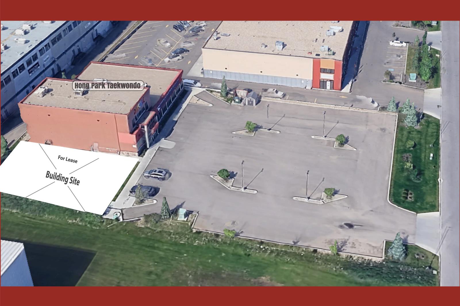 A red building with a sign that says "Hong Park Taekwondo" is for lease.