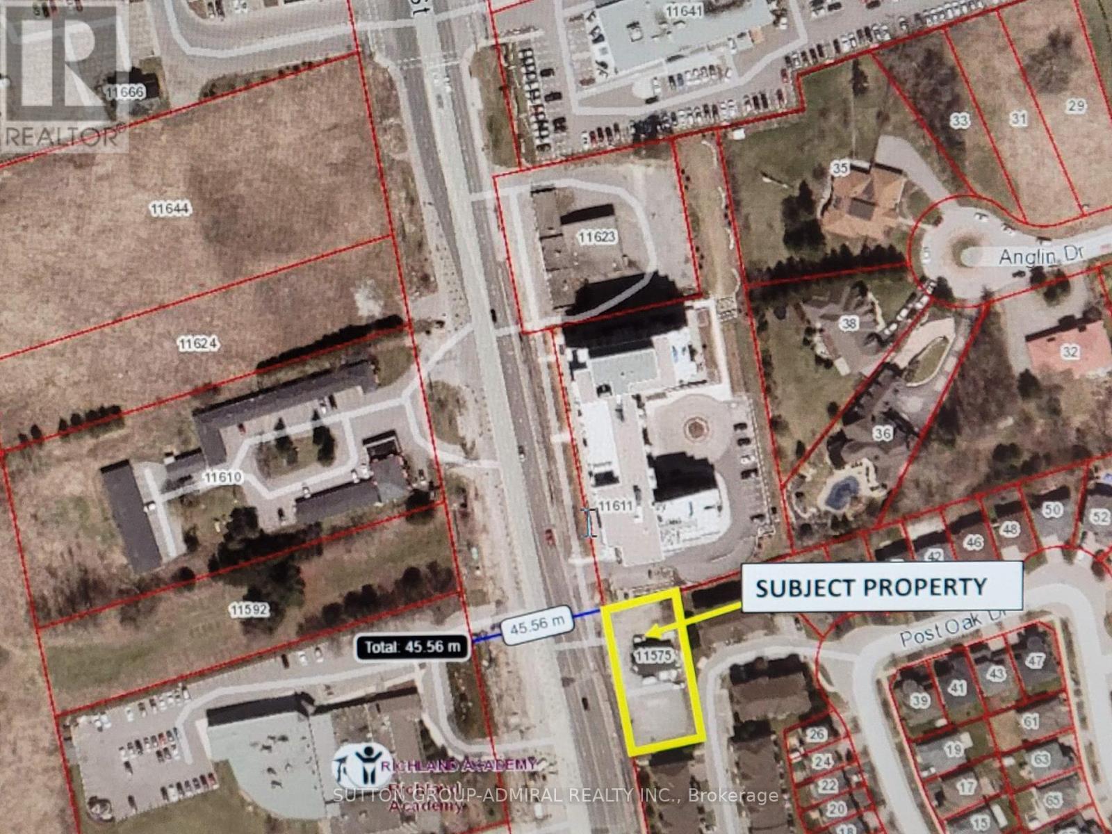 An aerial view of a map with a yellow box highlighting a subject property.