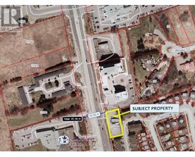 An aerial view of a map with a yellow box highlighting a subject property.