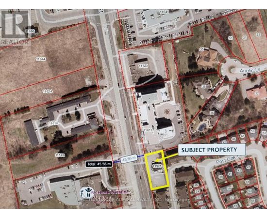 An aerial view of a map with a yellow box highlighting a subject property.