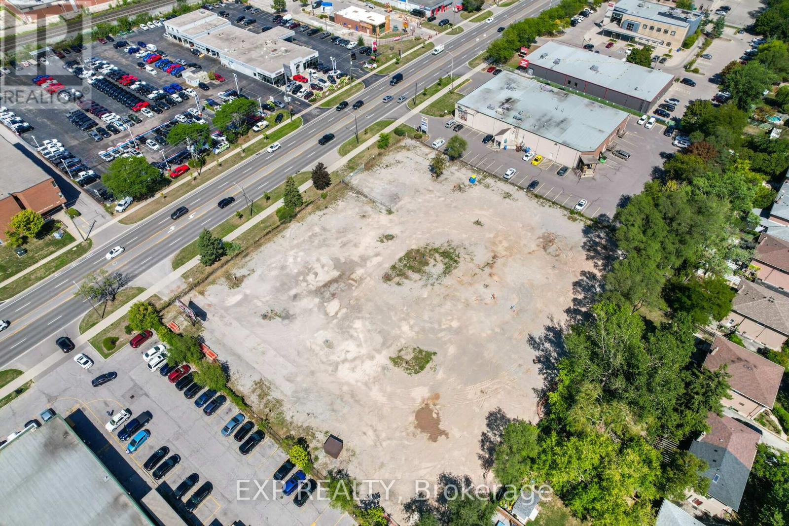 An aerial view of a parking lot with a large open area in the middle.