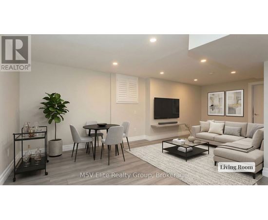 A living room with a dining table and chairs.