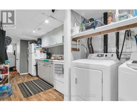 A laundry room with a washer and dryer.
