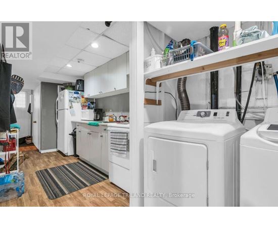 A laundry room with a washer and dryer.