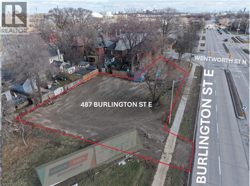 An aerial view of a property at 487 Burlington St E with a red outline.
