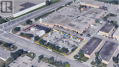 A parking lot with a yellow line in the middle.