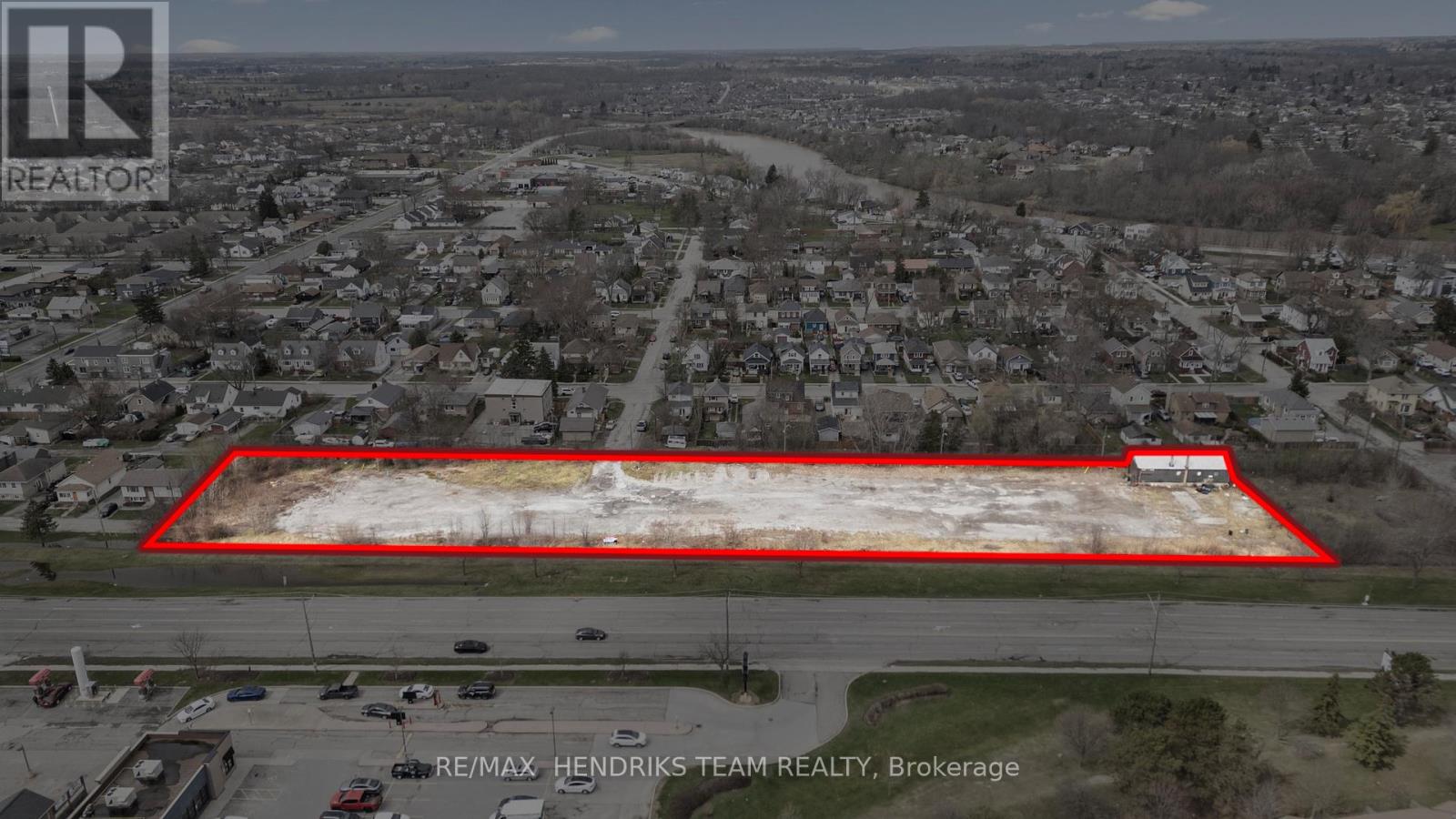 A red outlined area in the middle of a cityscape is highlighted in the image.