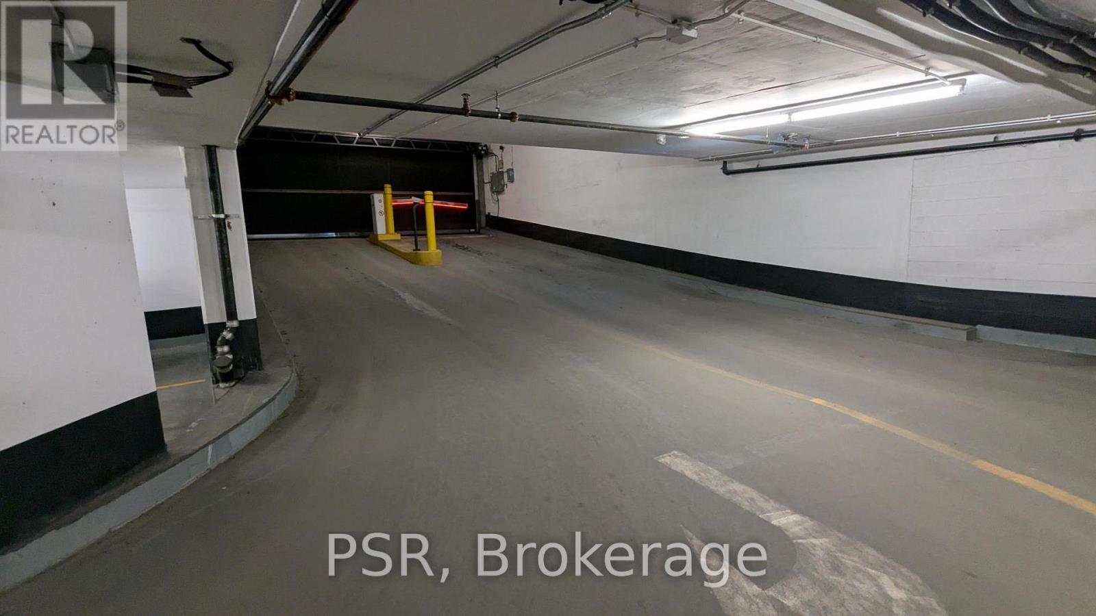 A tunnel with the words PSR Brokerage on the bottom.