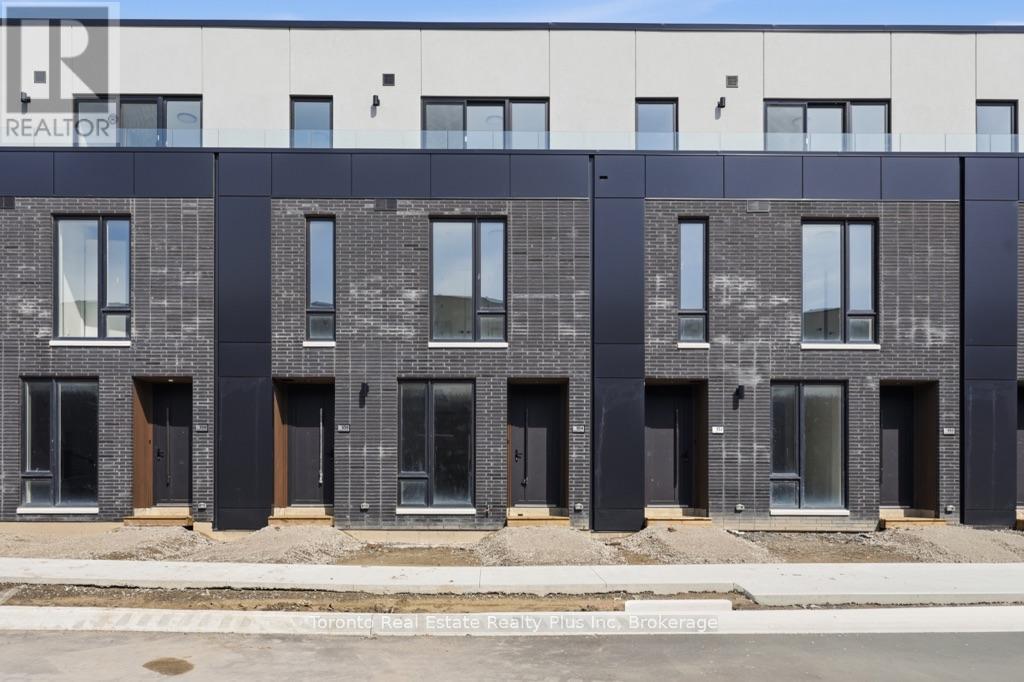A modern building with a mix of brick and panel facade.