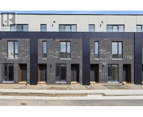 A building with a sign that says REALTOR on the top left corner.
