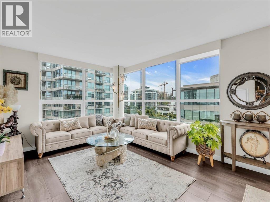 A well-lit living room with a large window and a view of a cityscape.