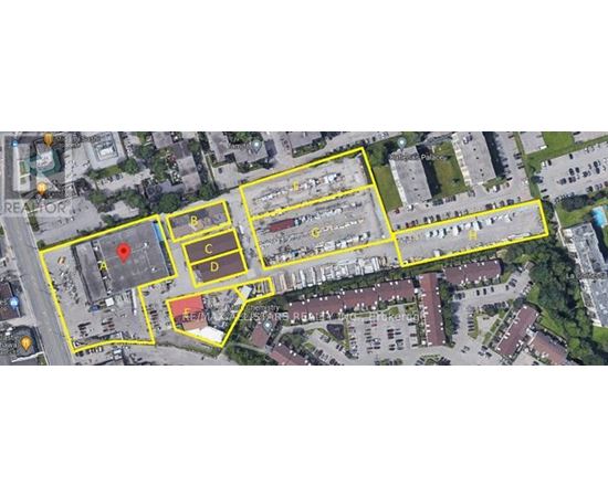A satellite image shows a large yellow area with a red marker in the middle.