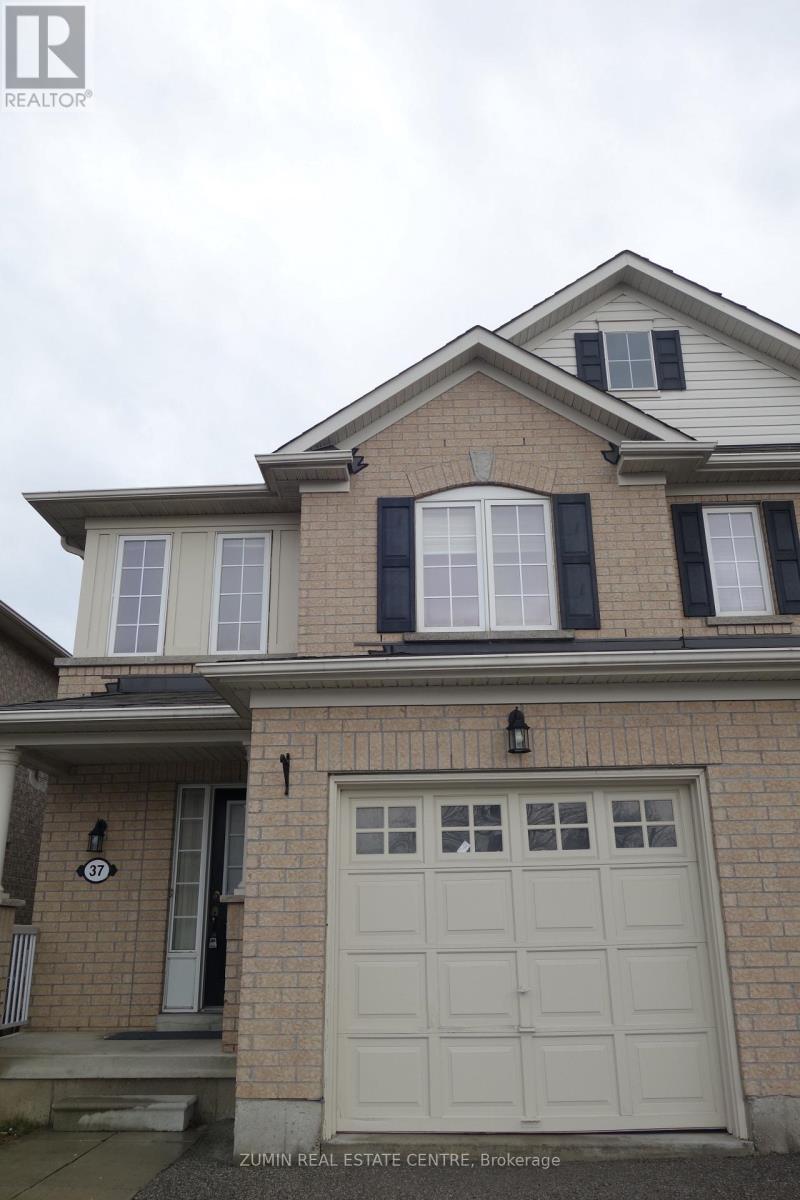 A house with a garage door and a sign that says "Zumin Real Estate Centre Brokerage".