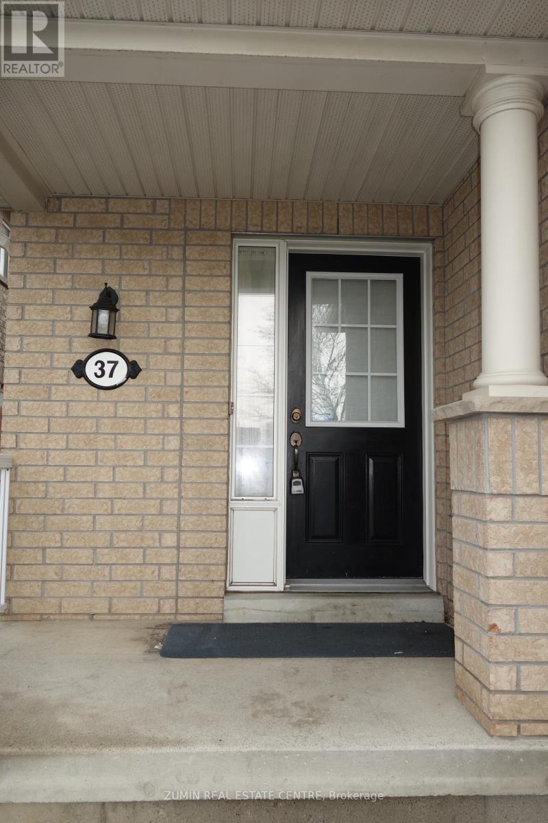 The house number 37 is displayed on the wall.