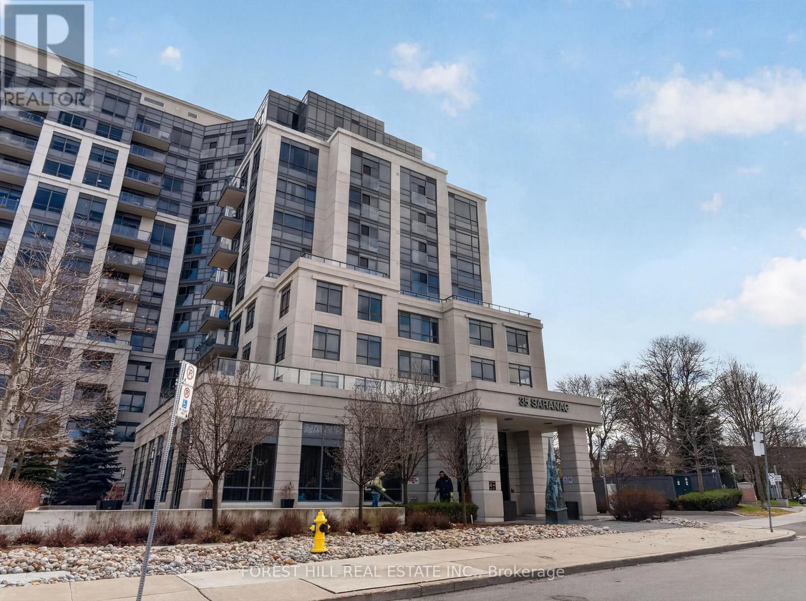 A large building with the words "FOREST HILL REAL ESTATE" on the front.
