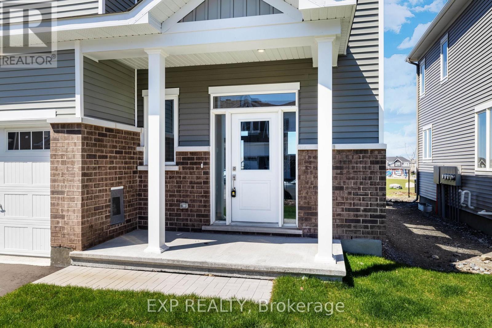 A house with a white door and a porch.