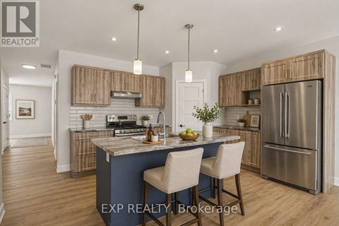 A modern kitchen with wooden cabinets and a blue island.