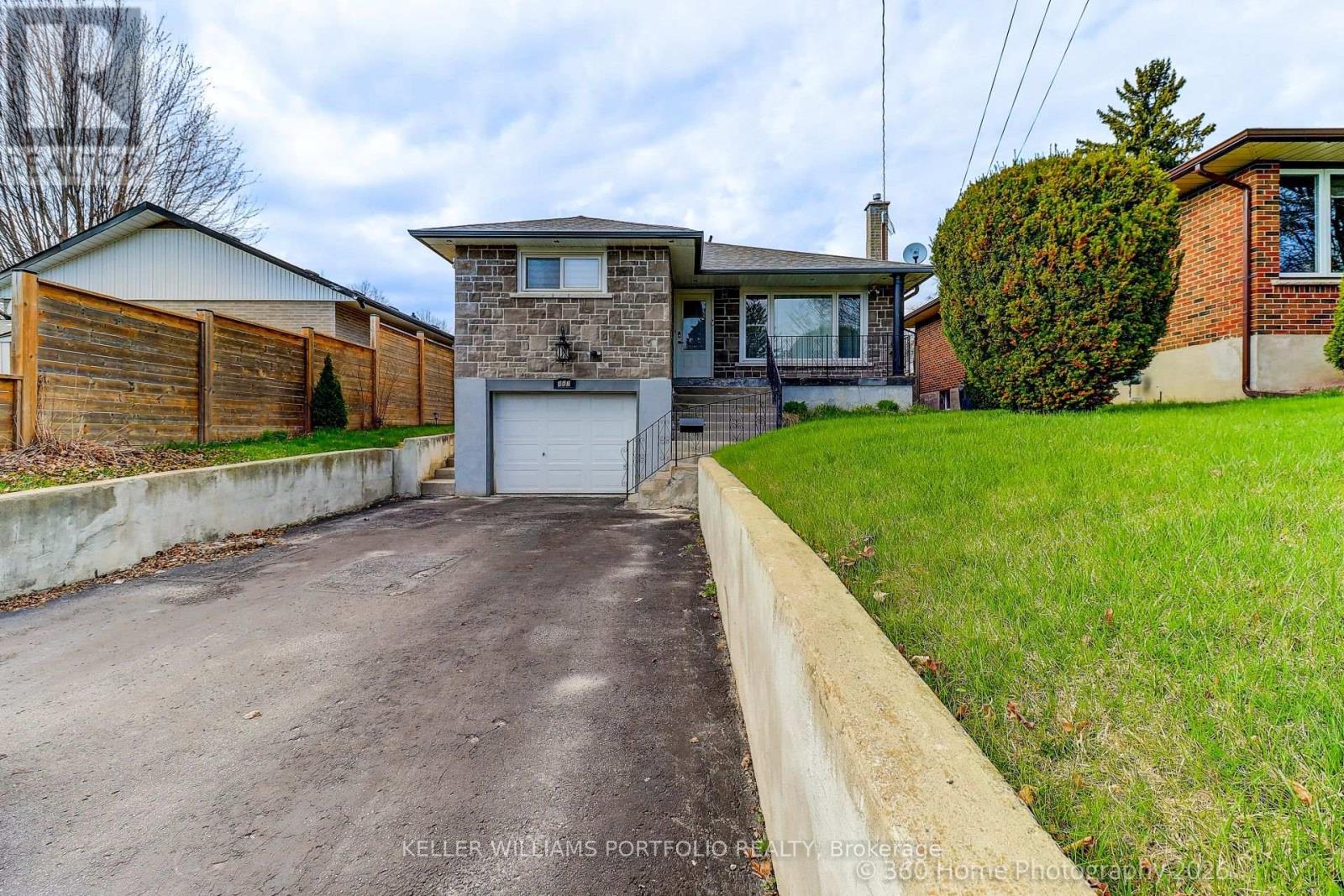 A residential area with a house and a garage.