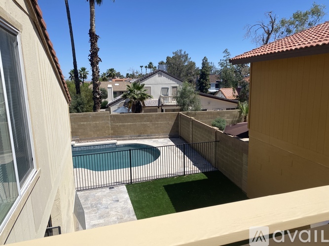 A house with a pool in the backyard.