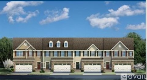 A row of houses are available for sale.
