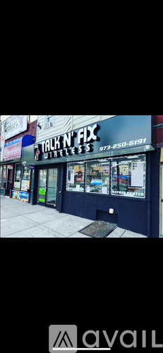 A storefront with the name "Talk N' FX" on it.