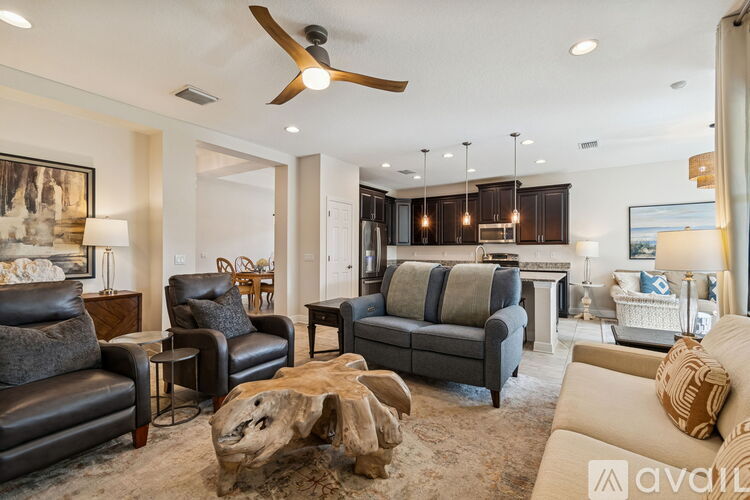 A living room with a wood coffee table and a white couch.
