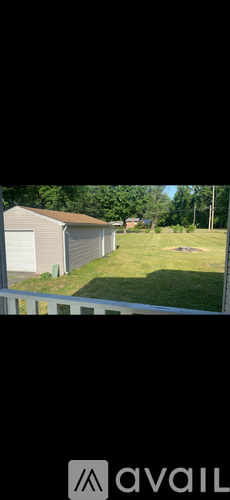 A house with a garage is available for rent.