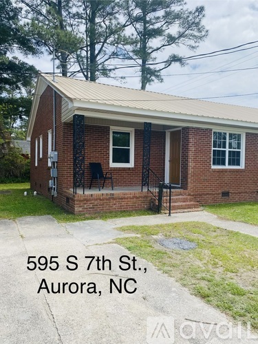 A house at 595 S 7th St, Aurora, NC is shown.