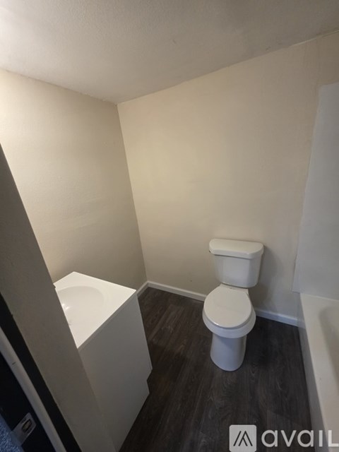 A small bathroom with a toilet and sink.