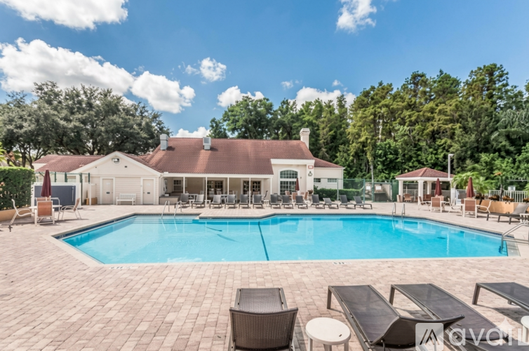 A large house with a pool in the backyard.
