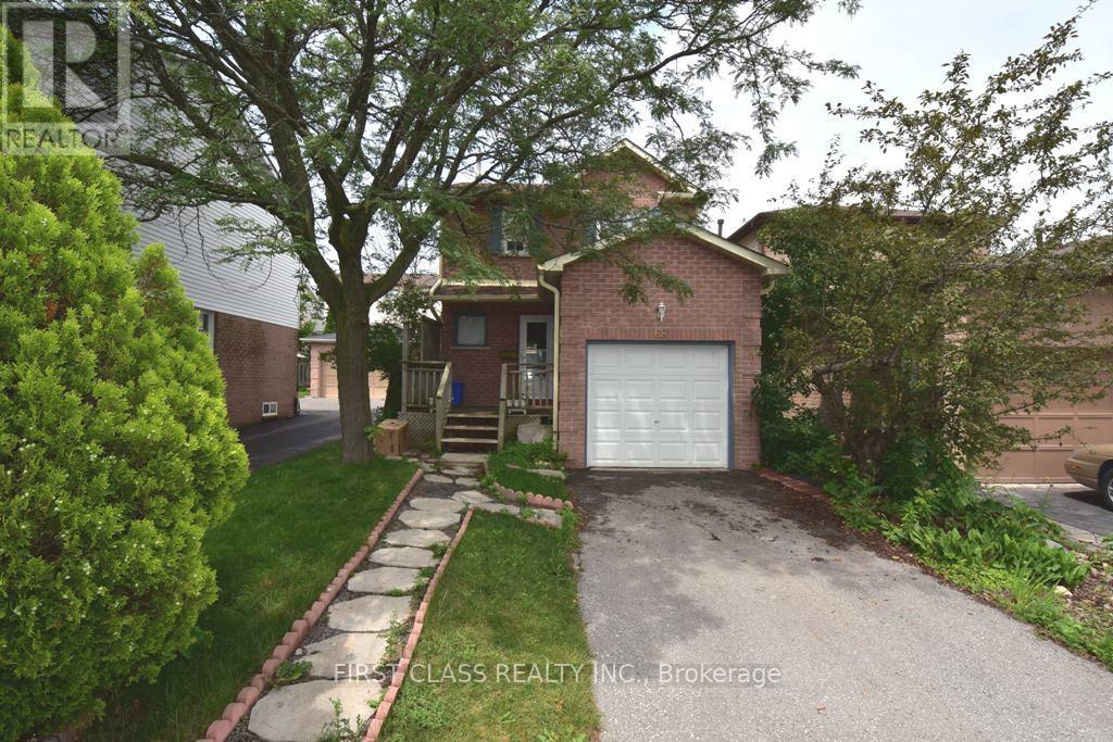 A house with a garage is for sale.