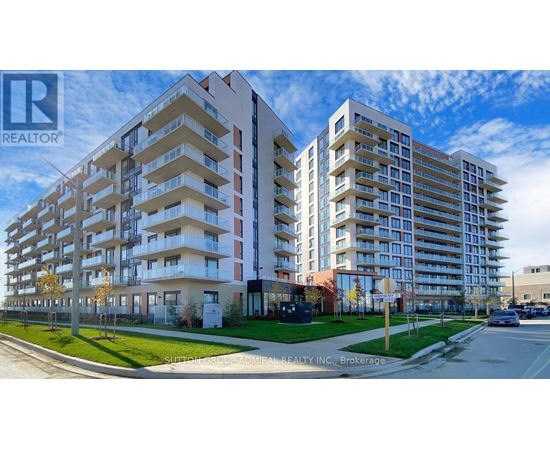 A large apartment complex with a sign that says REALTOR.